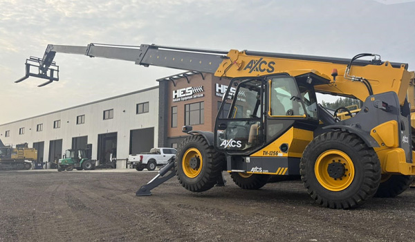 axcs lify parked in front of new HES Building